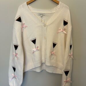 Francesca's Collections Cream Cardigan with Pink Bows